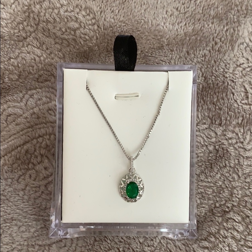 Silver pendant with green stone